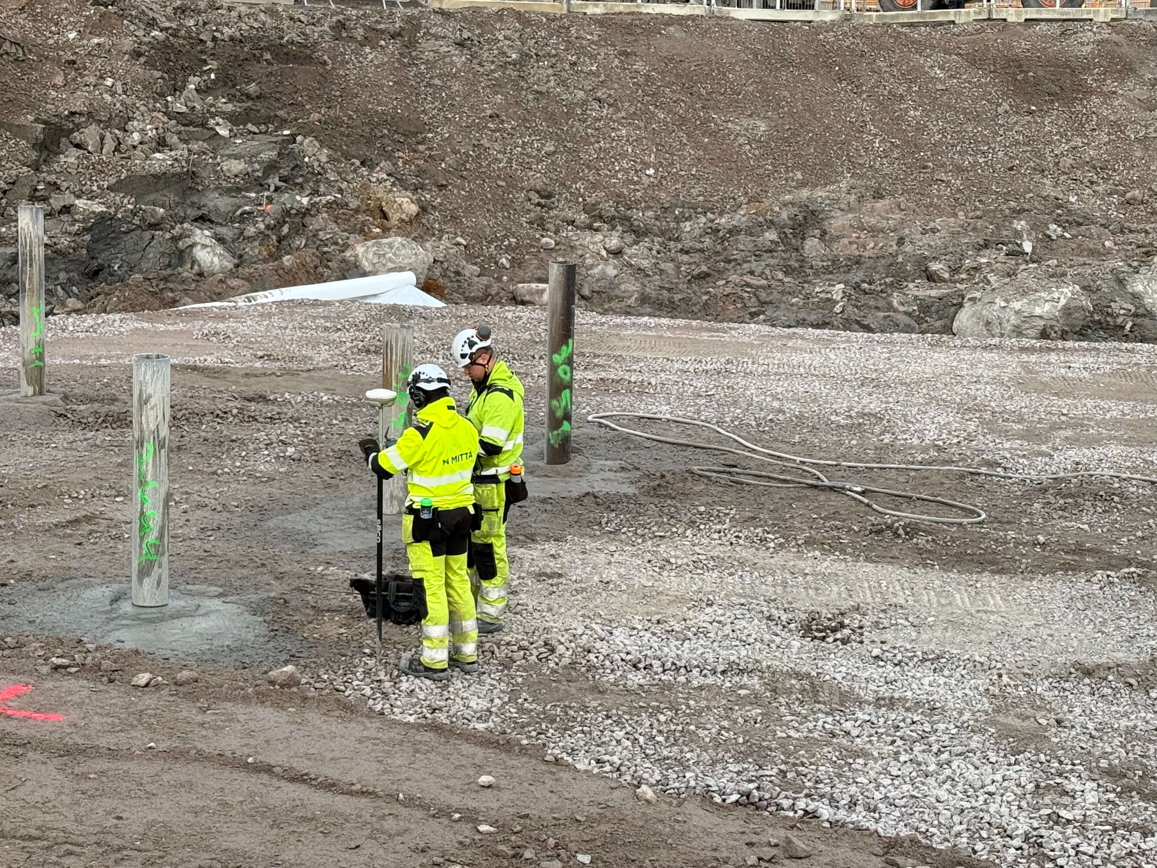 Construction workers collaborating on a project
