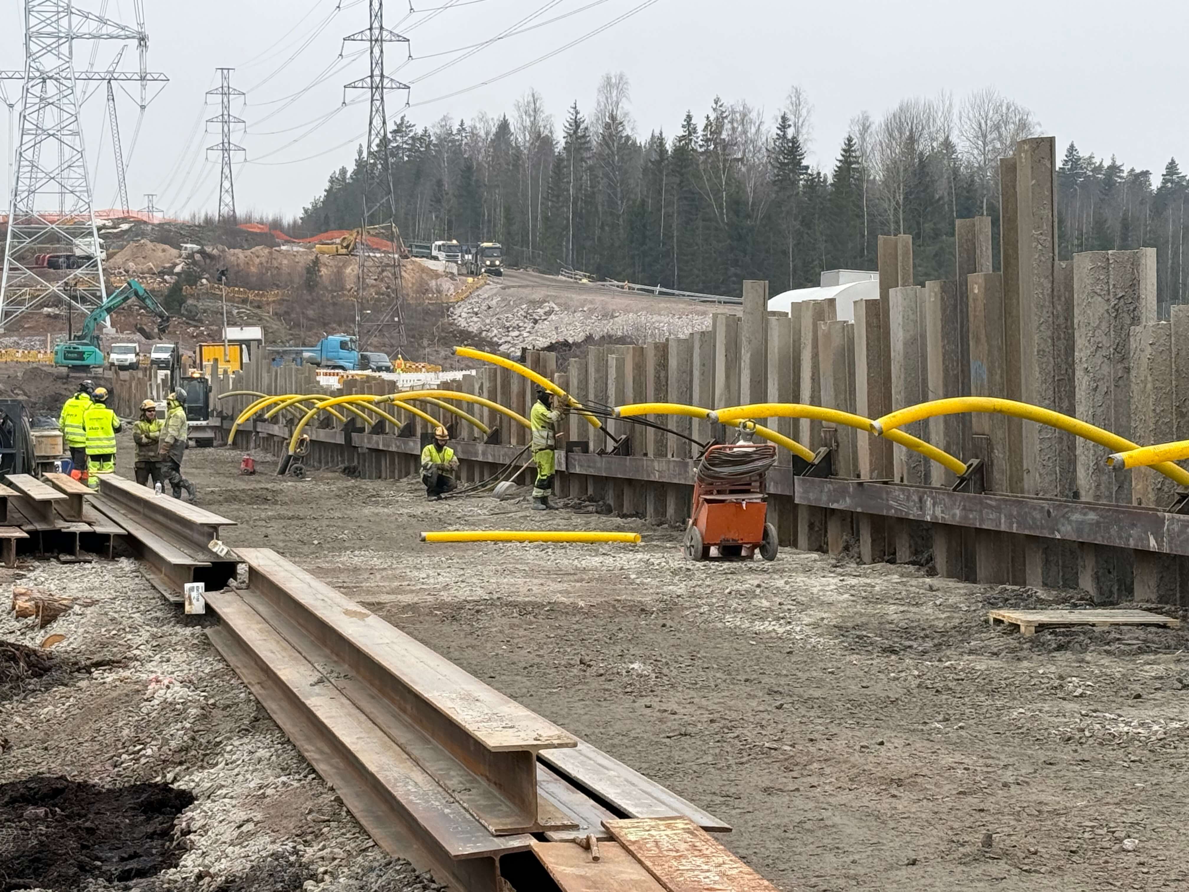 Workers on site shoring up a structure